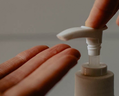 Using Hand Sanitizer